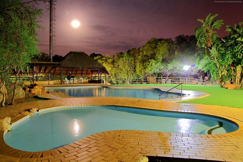 Nighttime pool with full moon