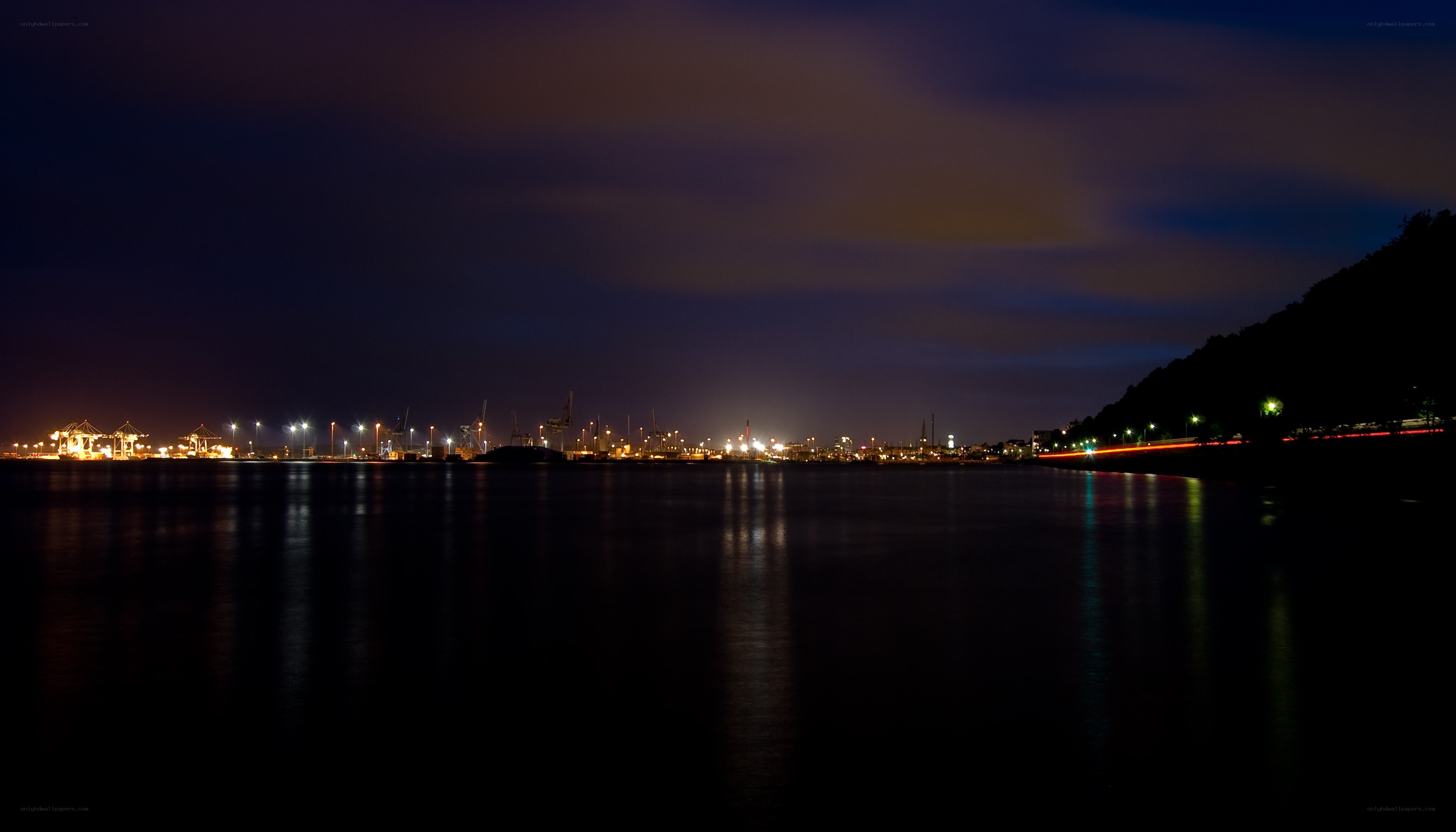 nighttime port city view