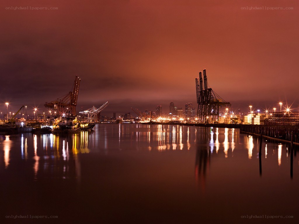 Nighttime port with cranes