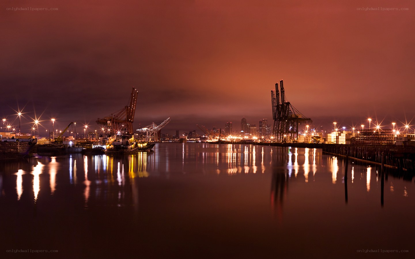nighttime port with cranes