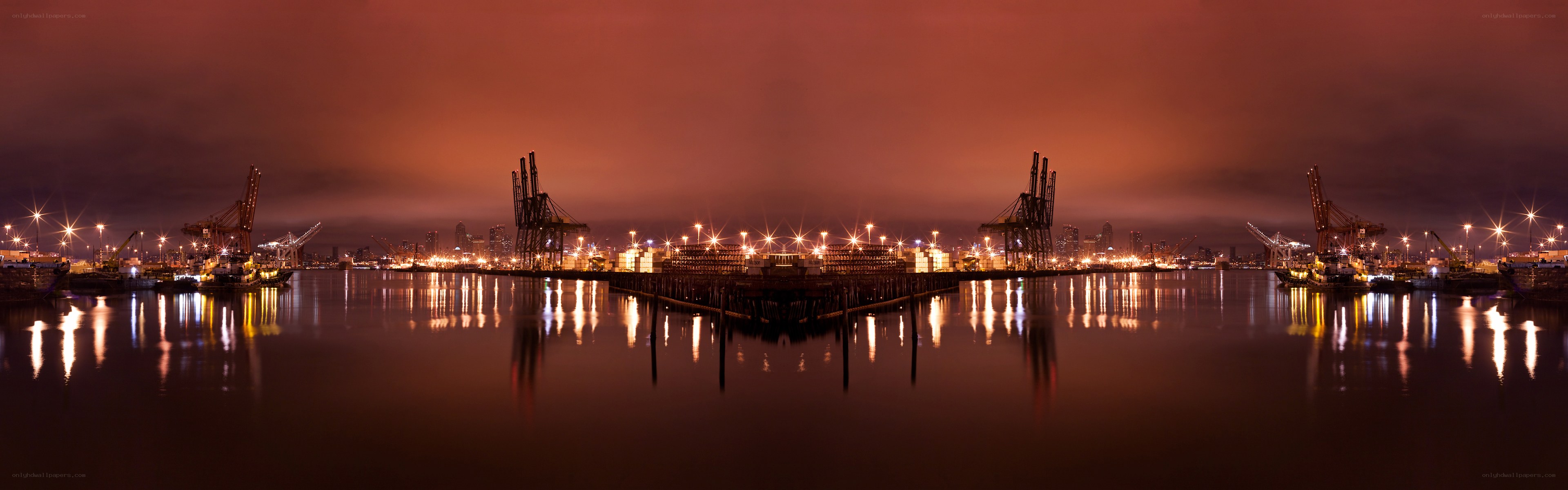 nighttime port with cranes