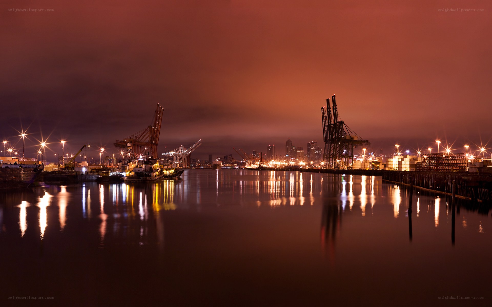 Nighttime port with cranes