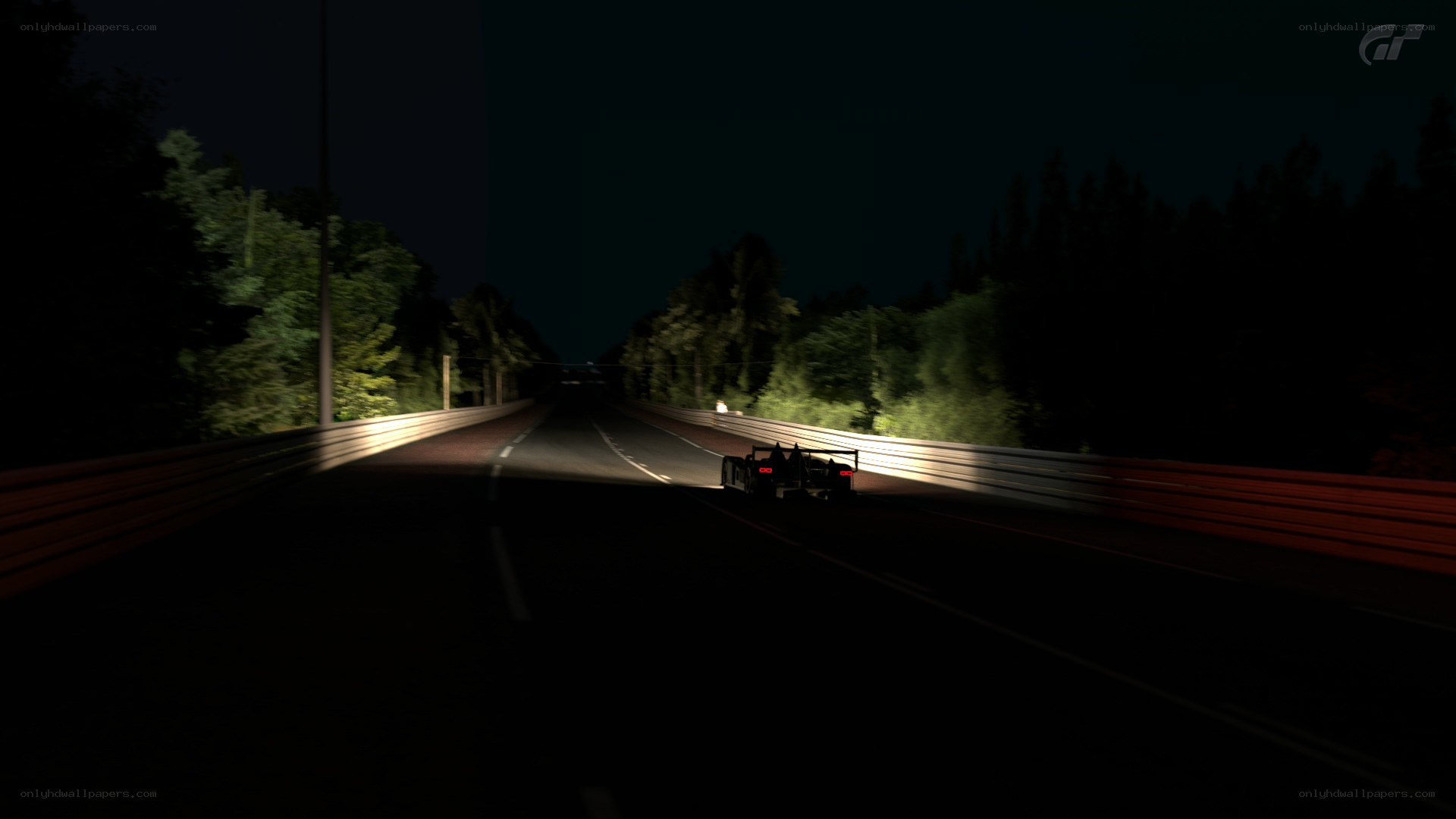 Nighttime race car on track