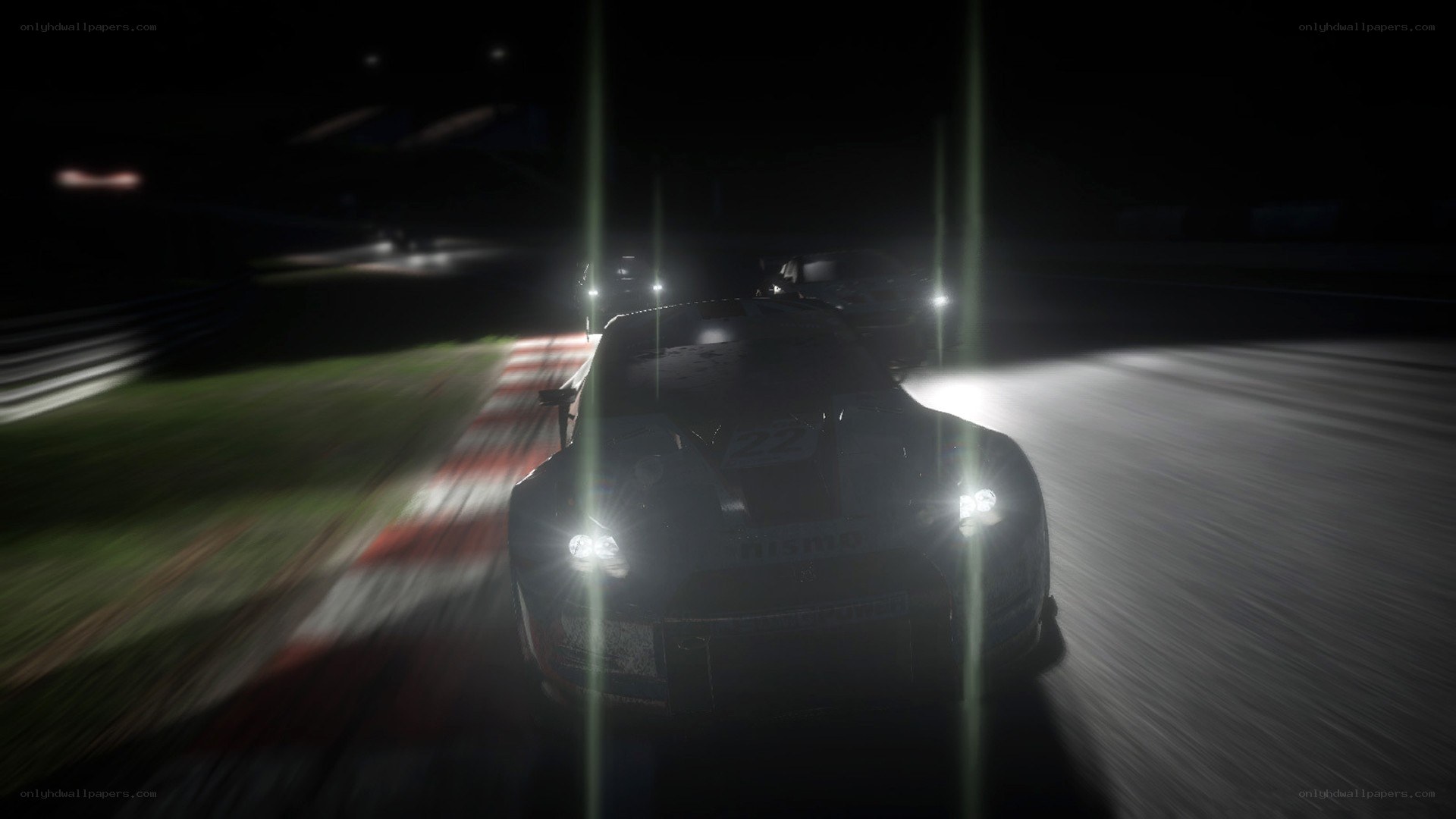 nighttime race car on track