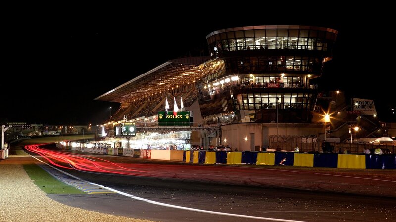 Nighttime race track scene