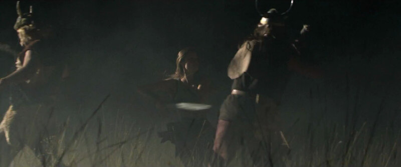 nighttime ritual with warriors