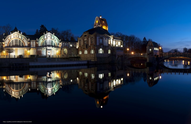 Nighttime riverfront architecture