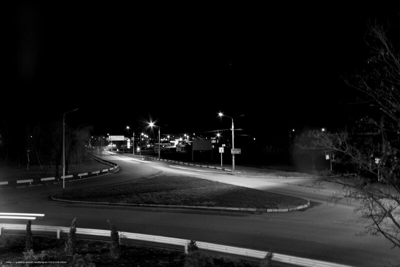 Nighttime road intersection