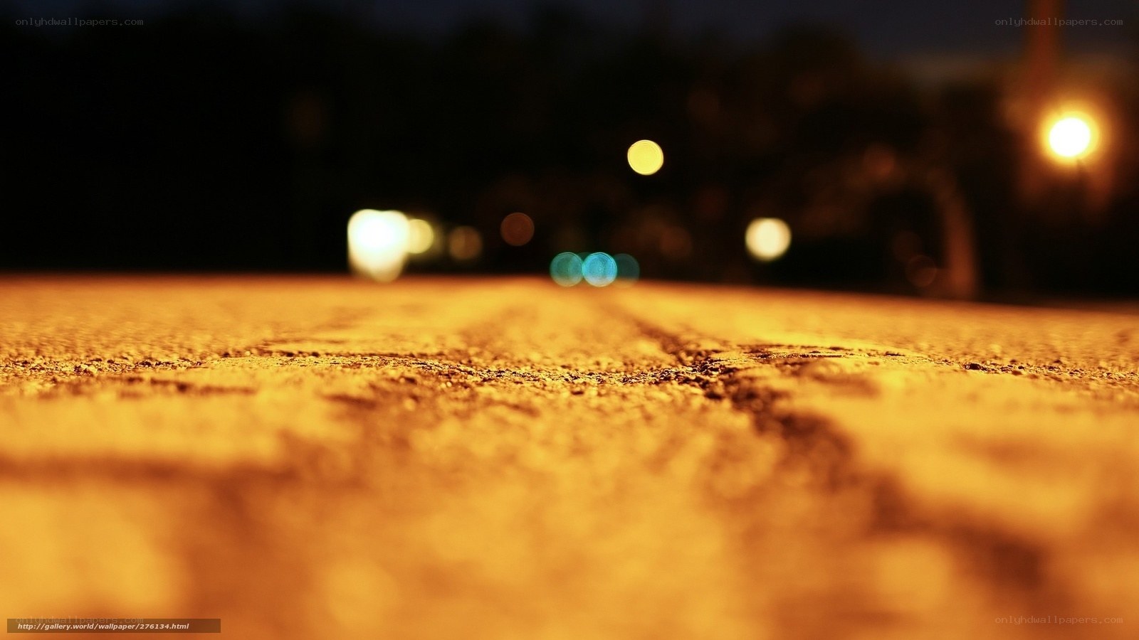 nighttime road with bokeh lights