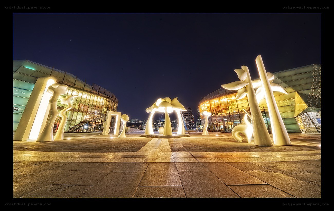 Nighttime sculpture plaza