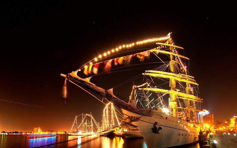 Nighttime ship festival in port