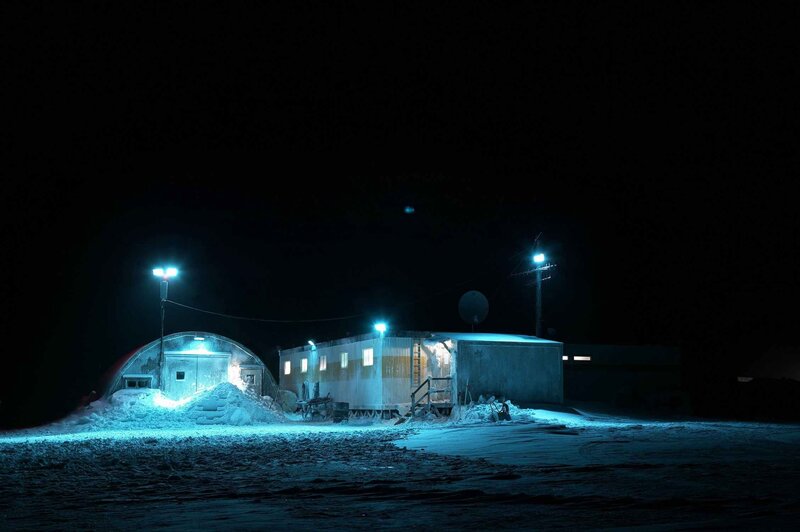 Nighttime snow camp scene