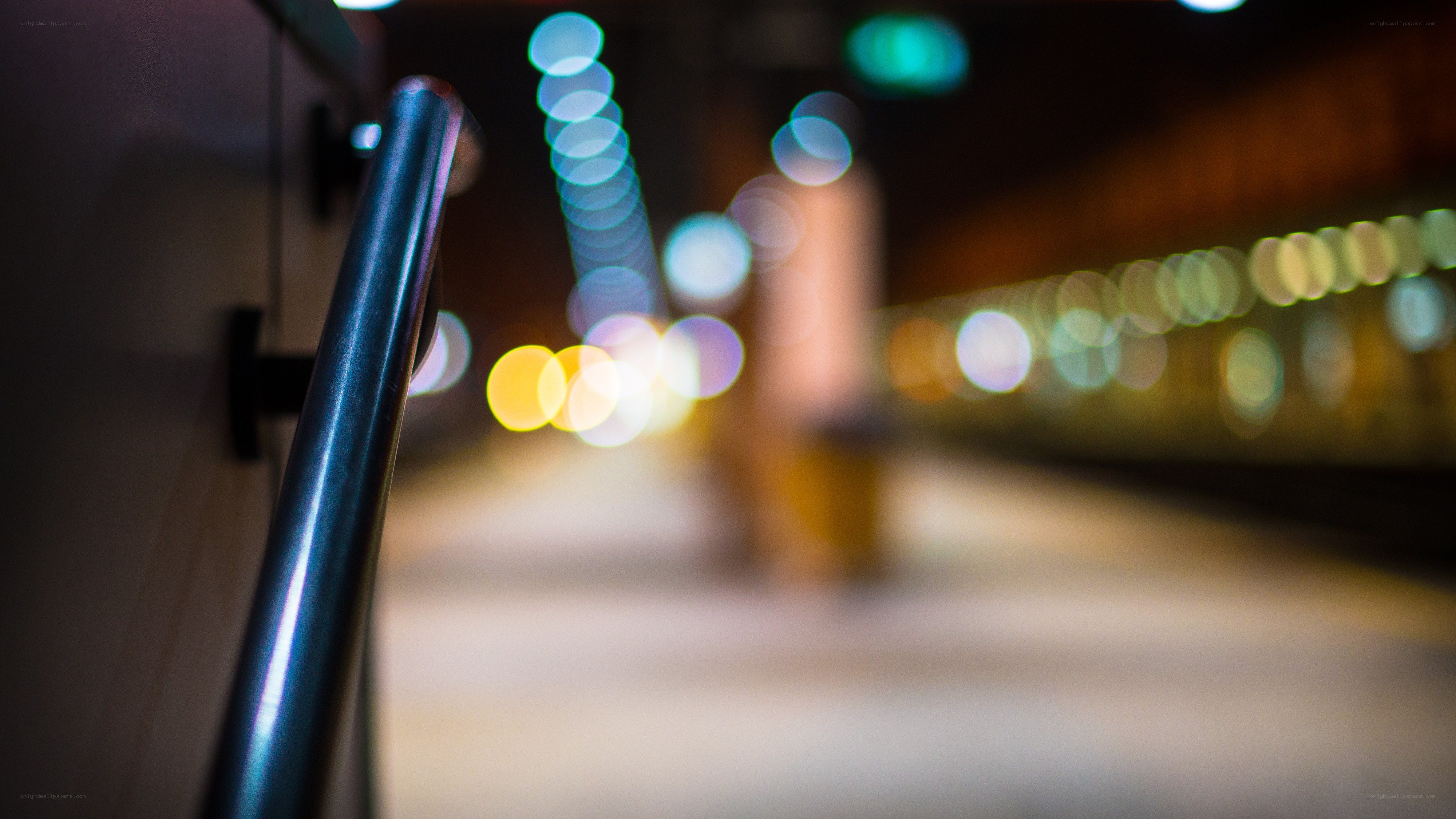 Nighttime station with bokeh lights