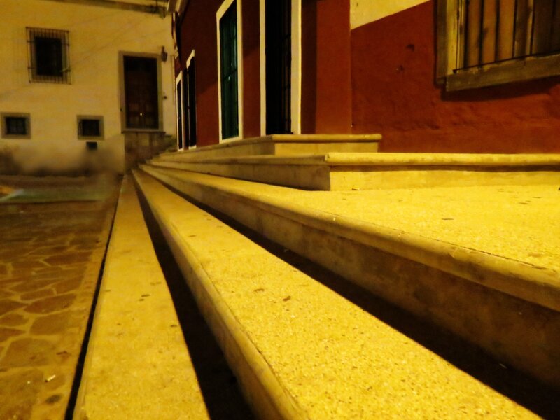nighttime steps in a narrow alley