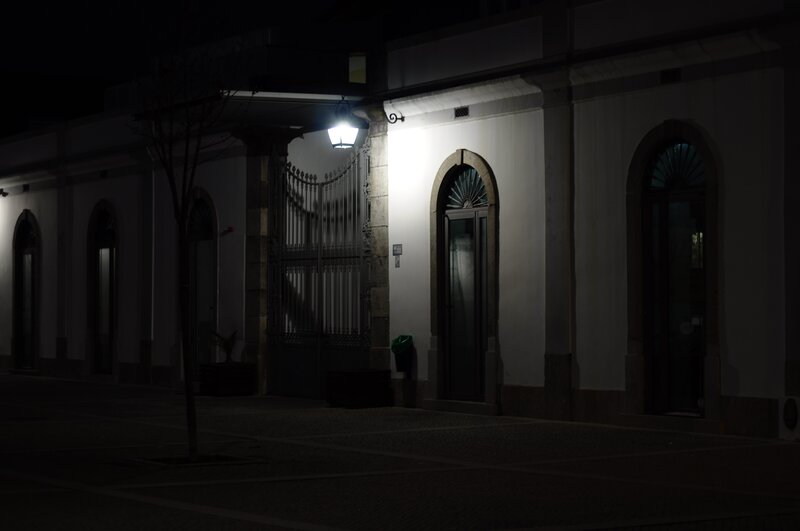 nighttime street scene with building