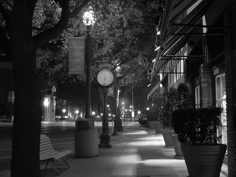 Nighttime street scene with clock