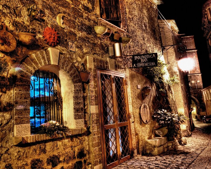 nighttime street scene with old building