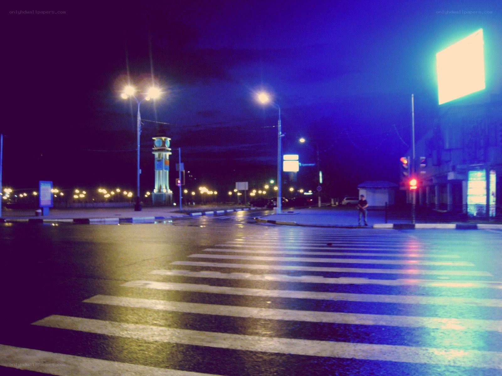 nighttime street with crosswalk