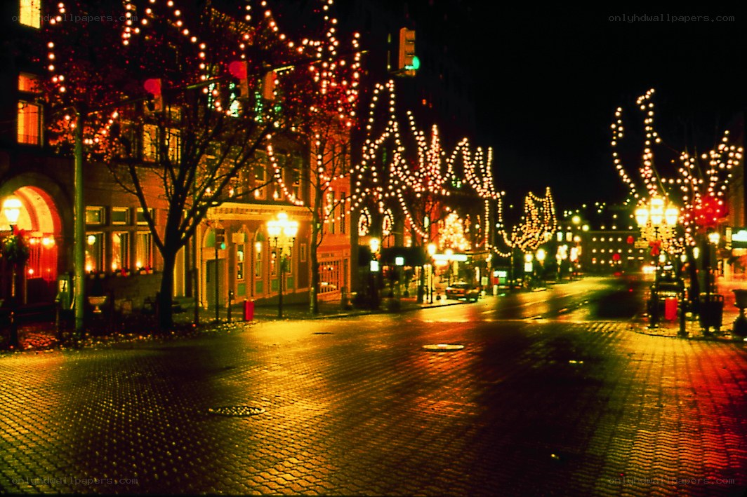 Nighttime street with holiday lights