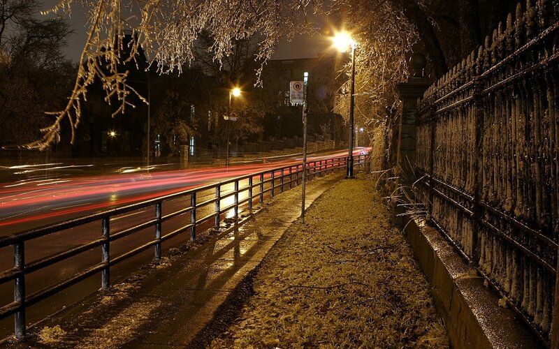 Nighttime street with light trails