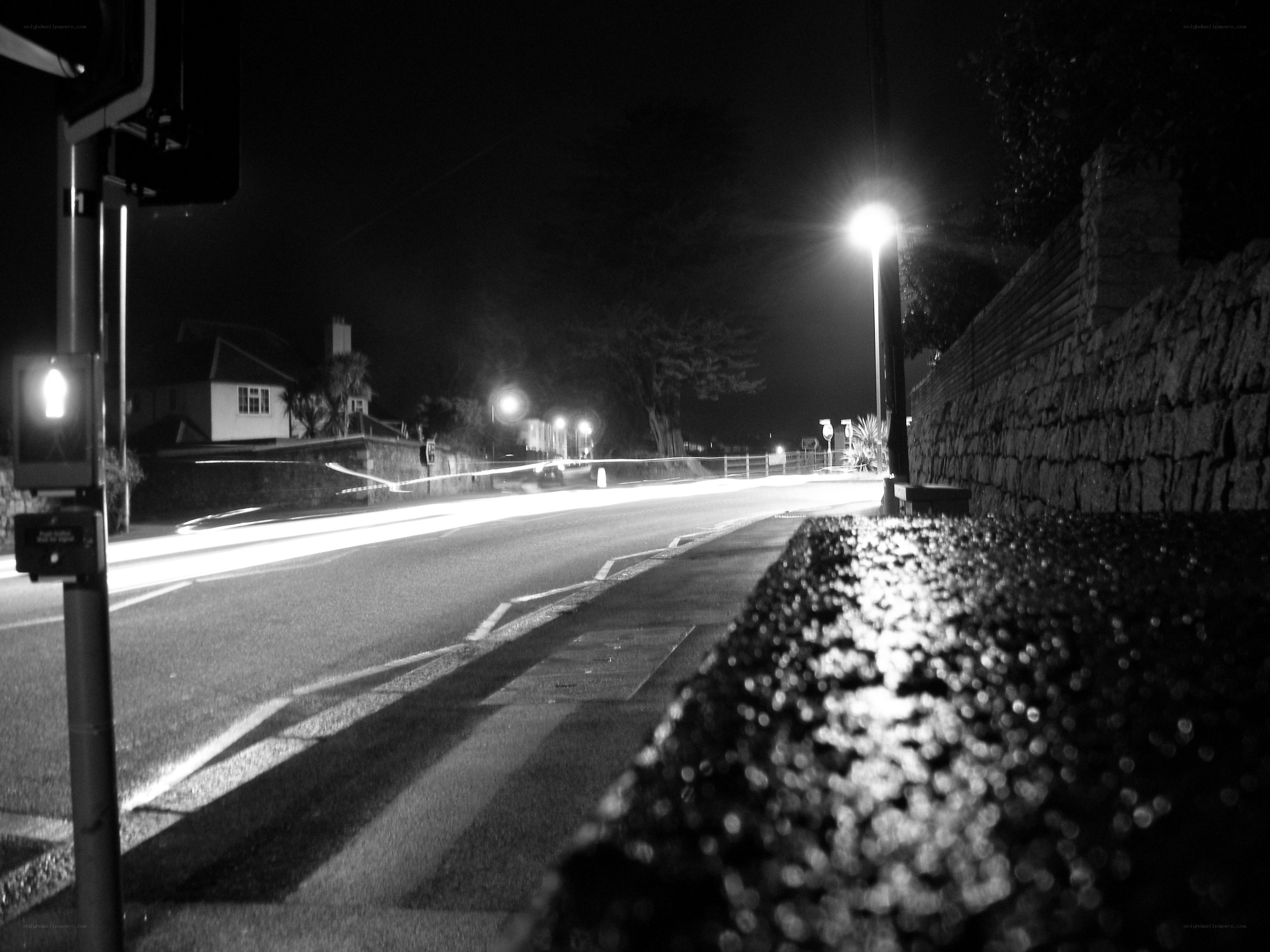 Nighttime street with light trails