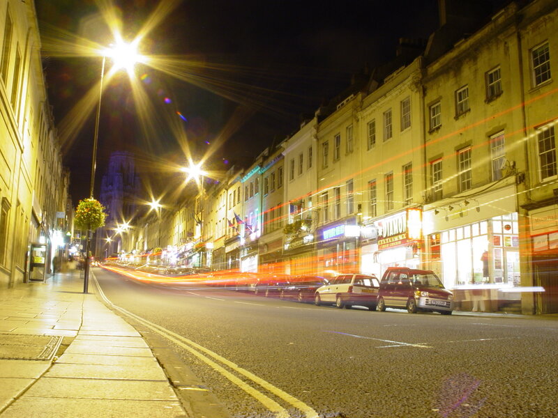 nighttime street with light trails