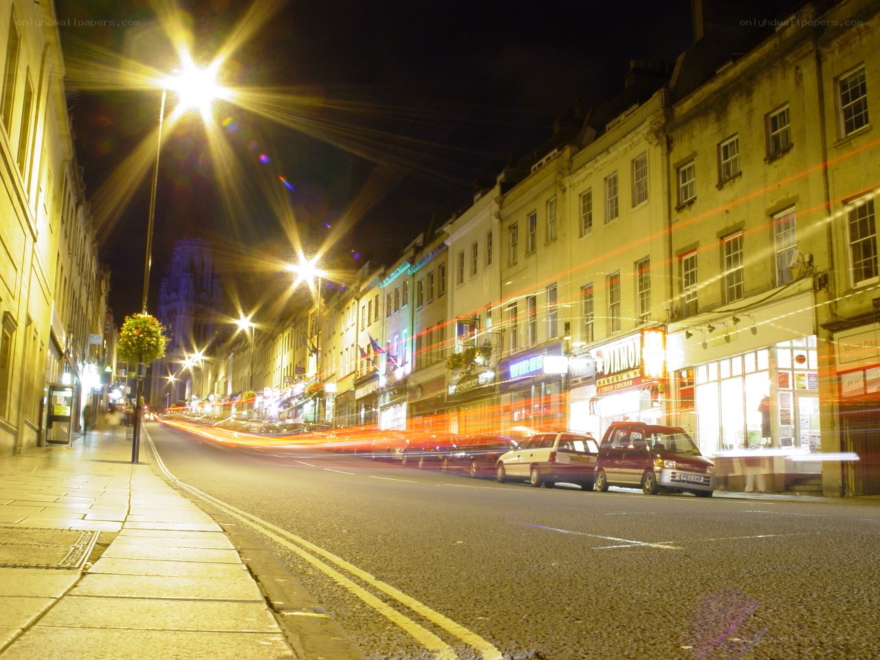 nighttime street with light trails
