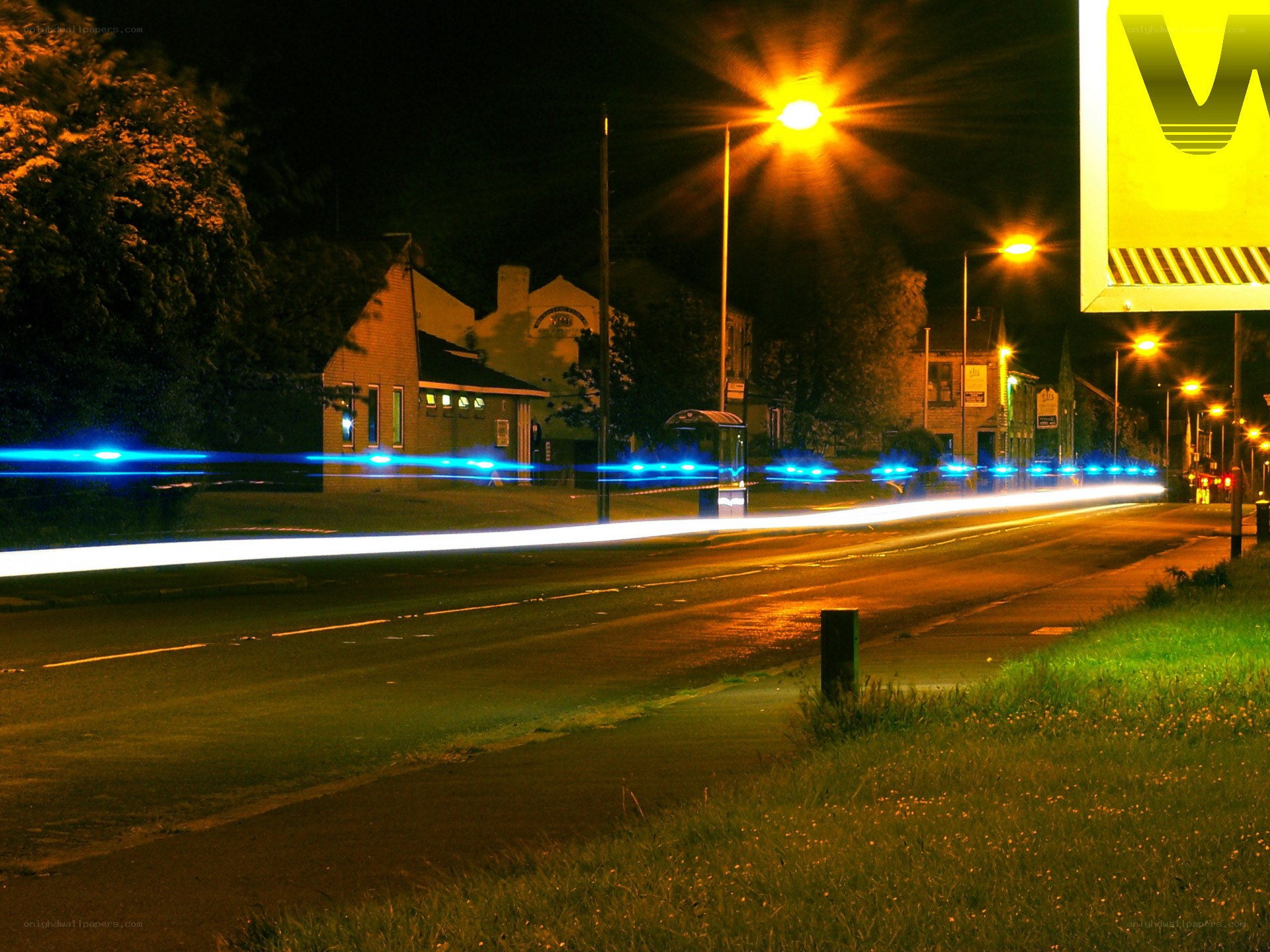 Nighttime street with light trails