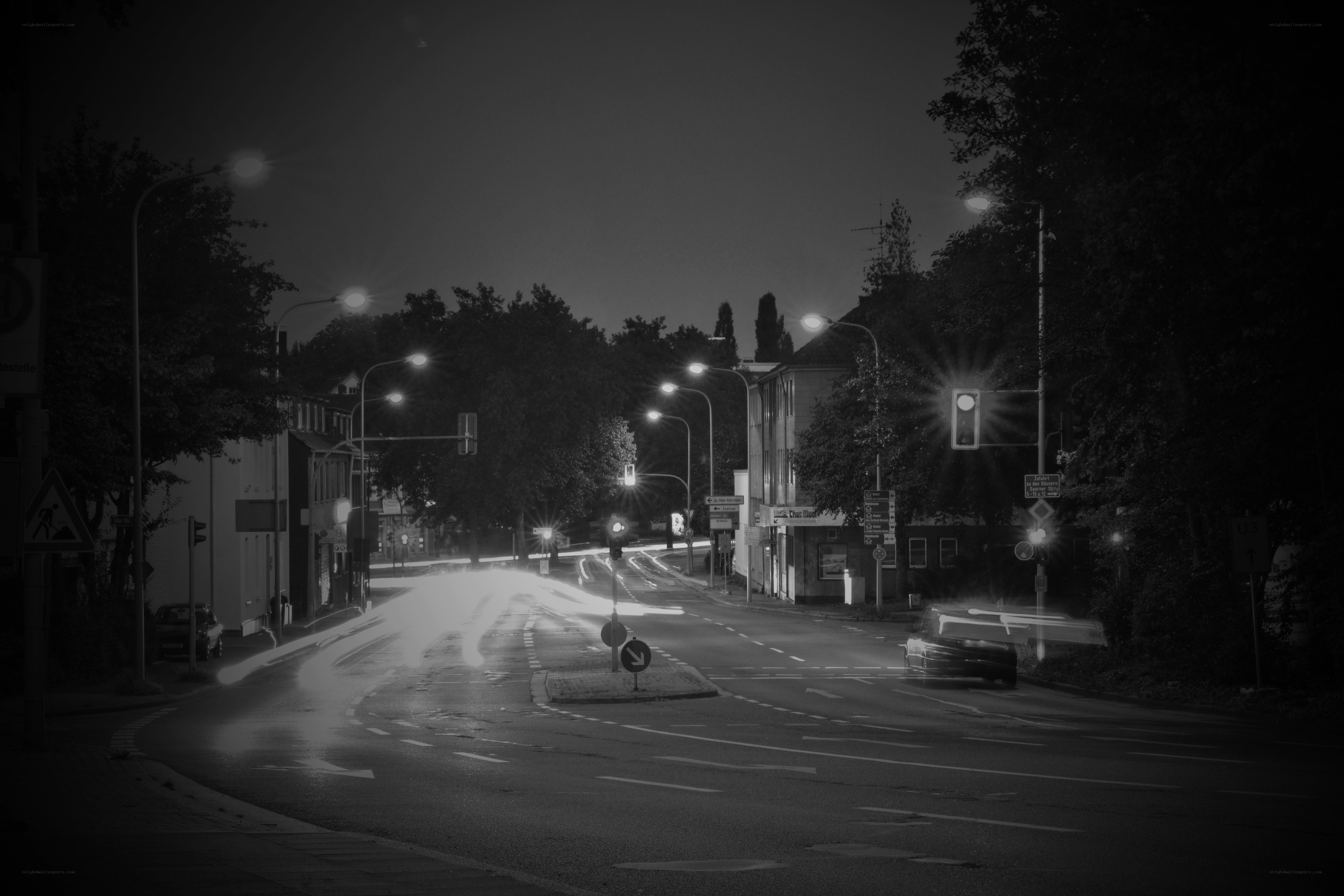 nighttime street with light trails