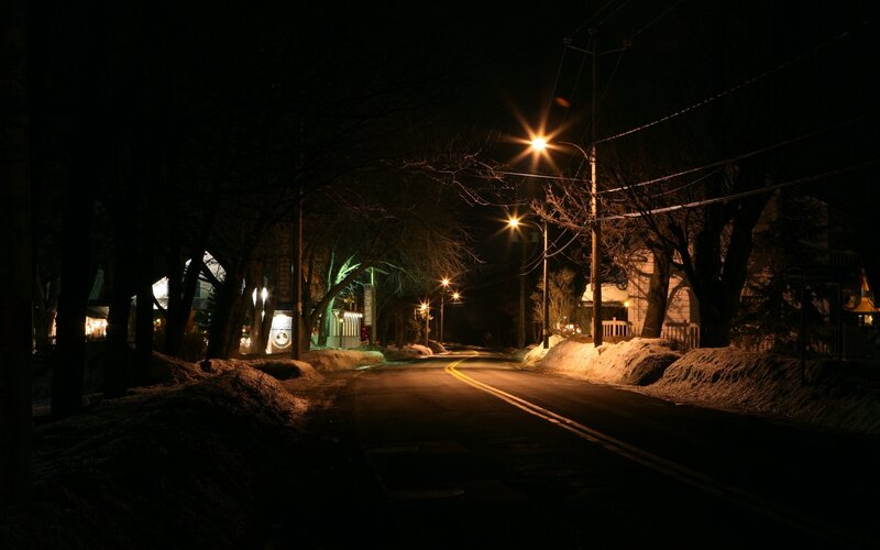 Nighttime street with snow