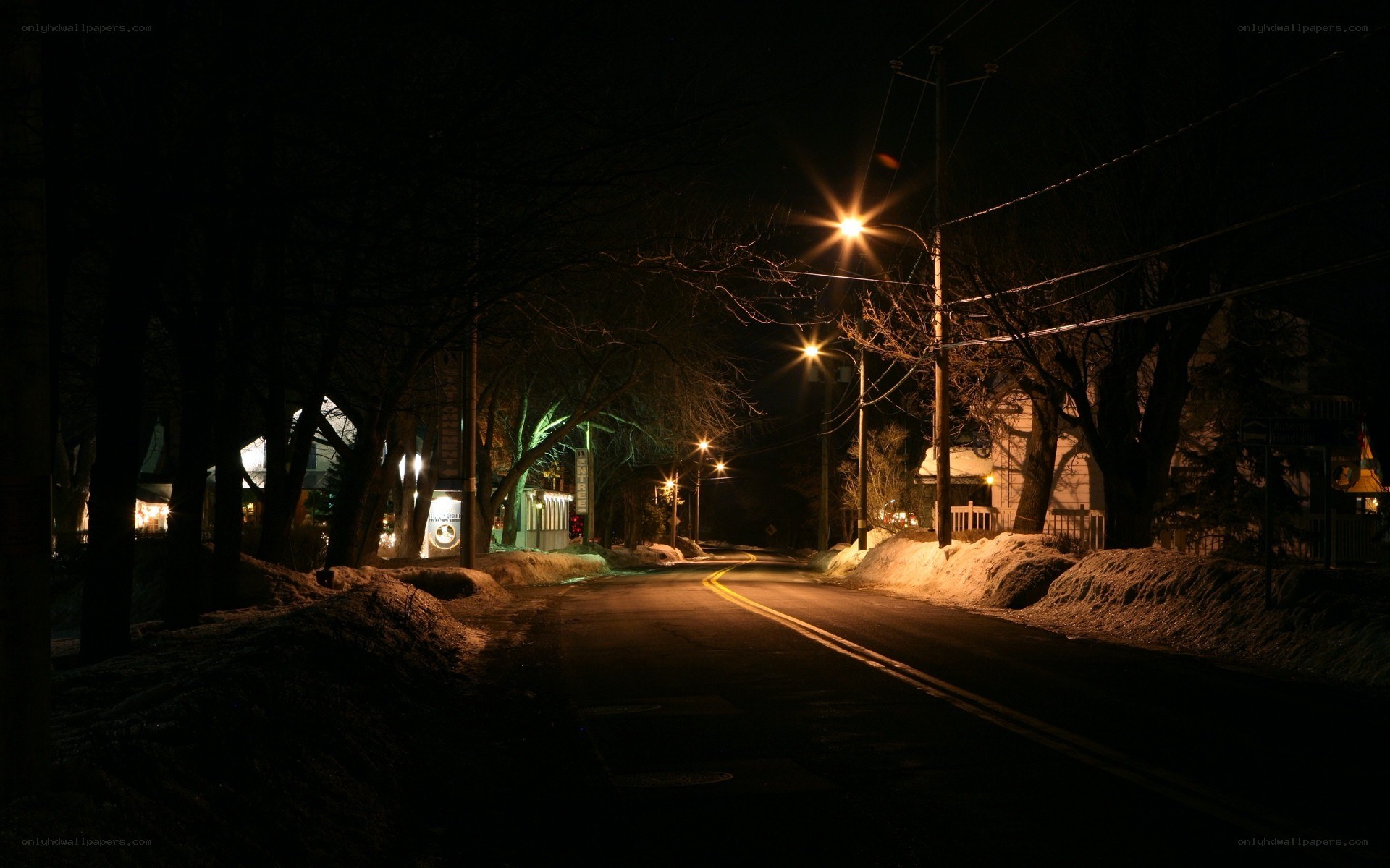 Nighttime street with snow