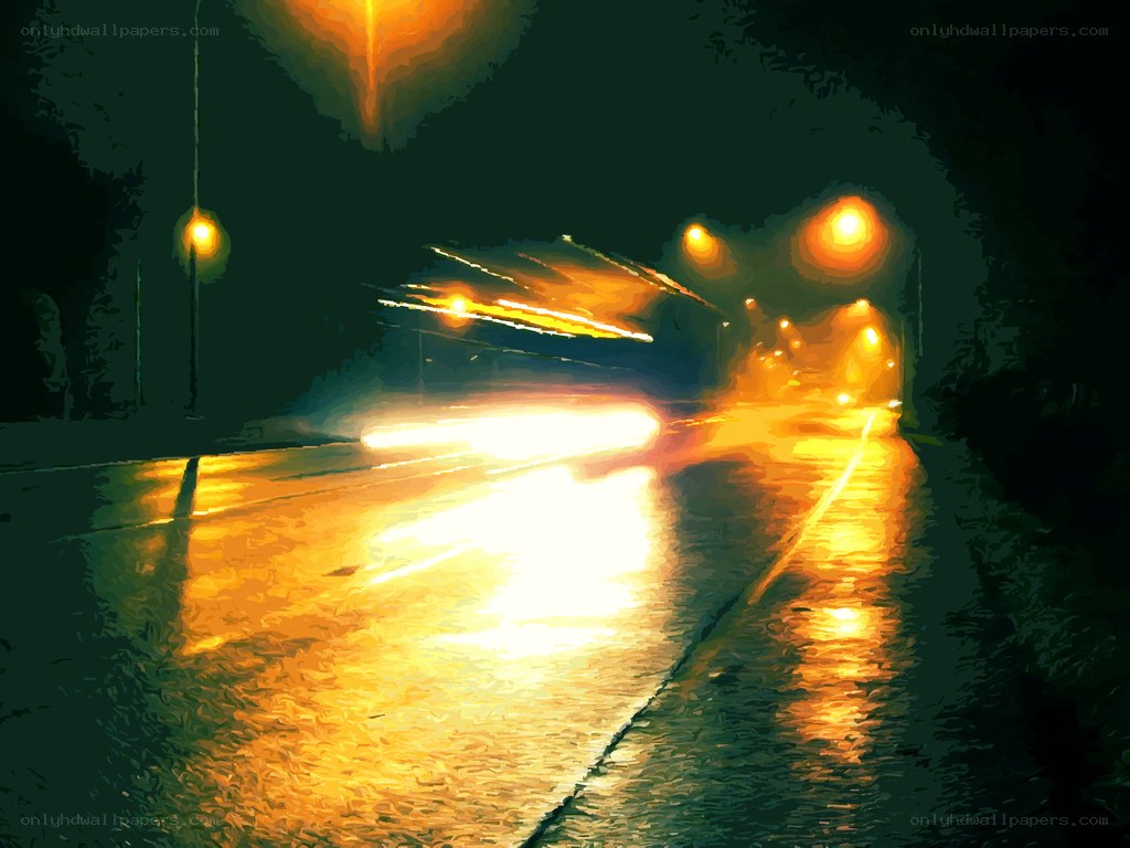 Nighttime street with wet road