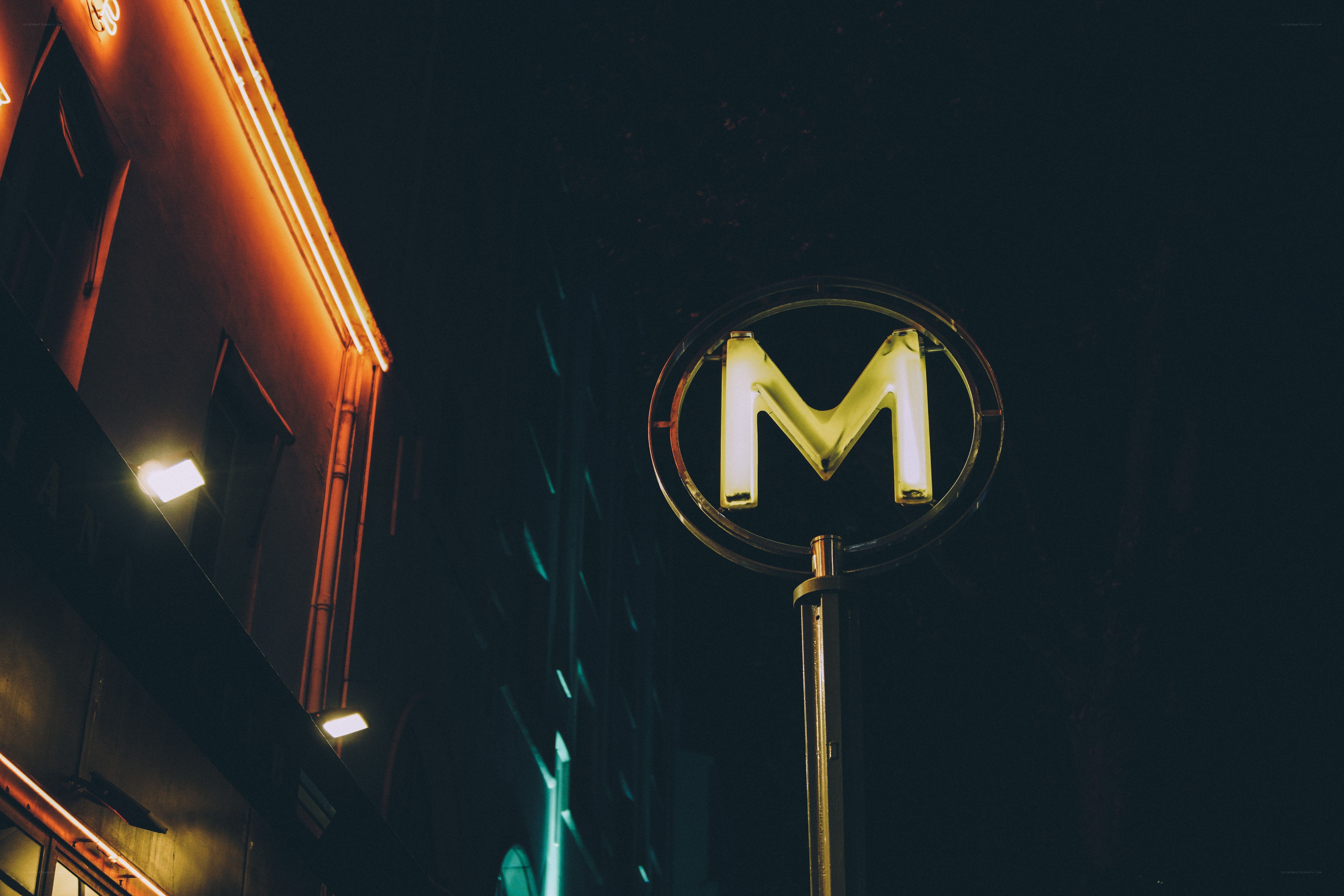 nighttime subway sign