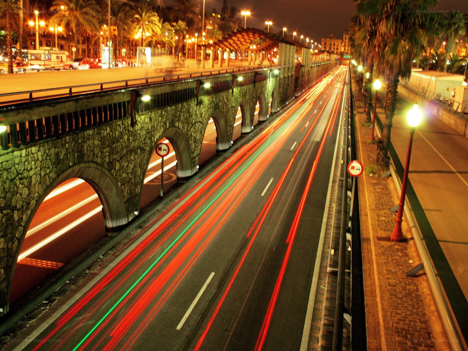 Nighttime traffic on a city bridge