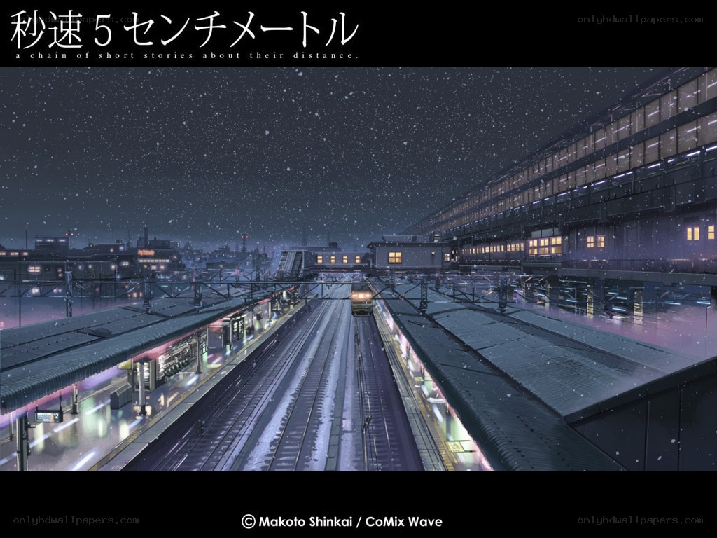 Nighttime train station in snow