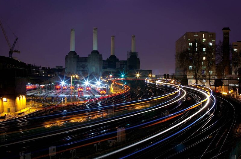 Nighttime train tracks at Battersea Power Station