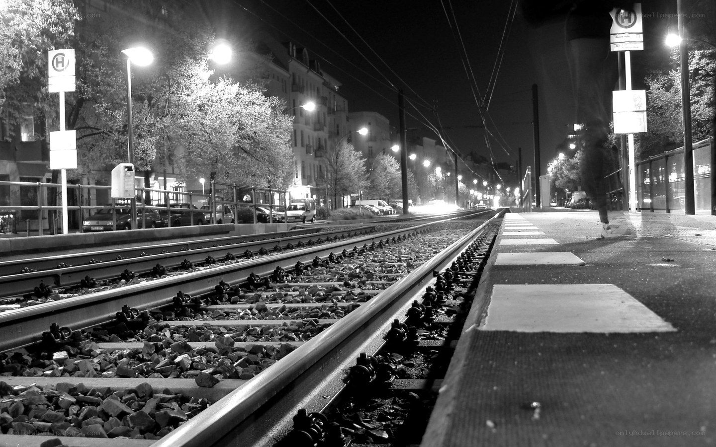 Nighttime tram tracks in city
