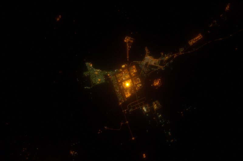 Nighttime view of a coastal city