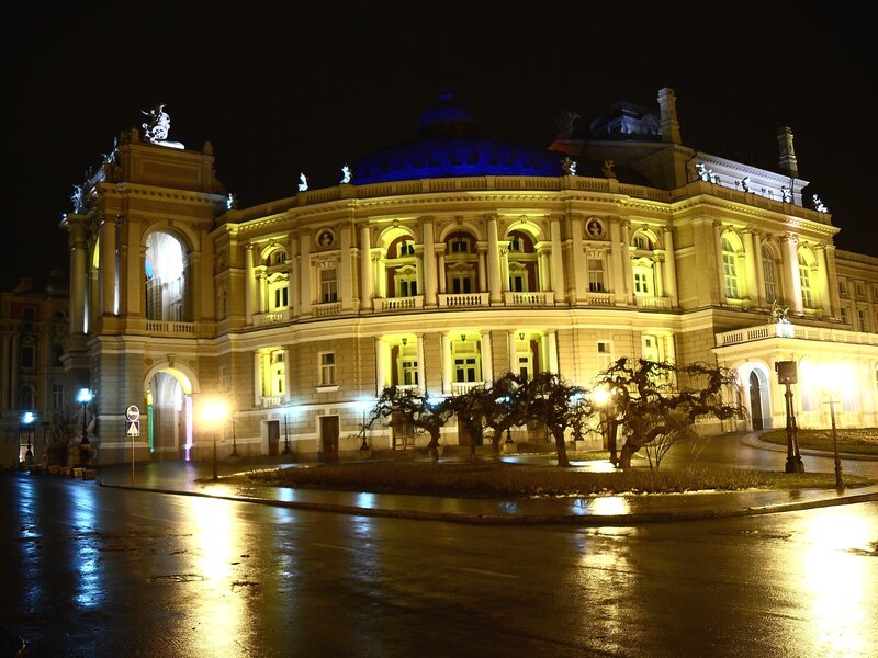 nighttime view of a grand theater