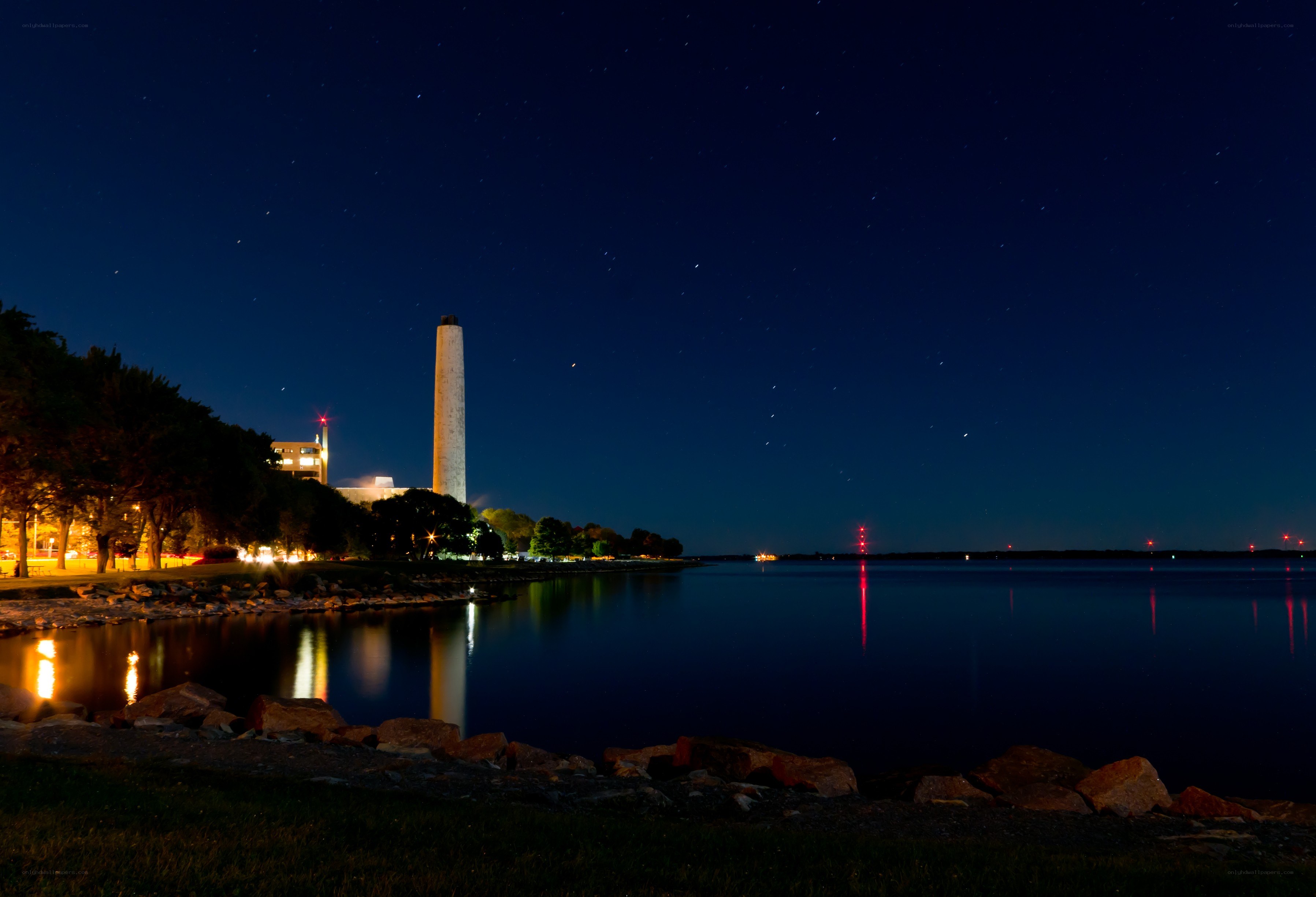 nighttime view of a lighthouse