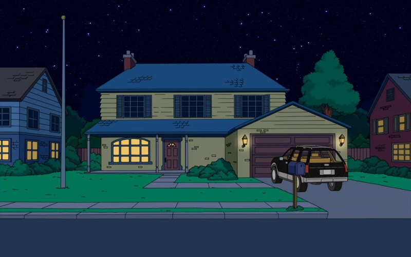 nighttime view of a suburban house