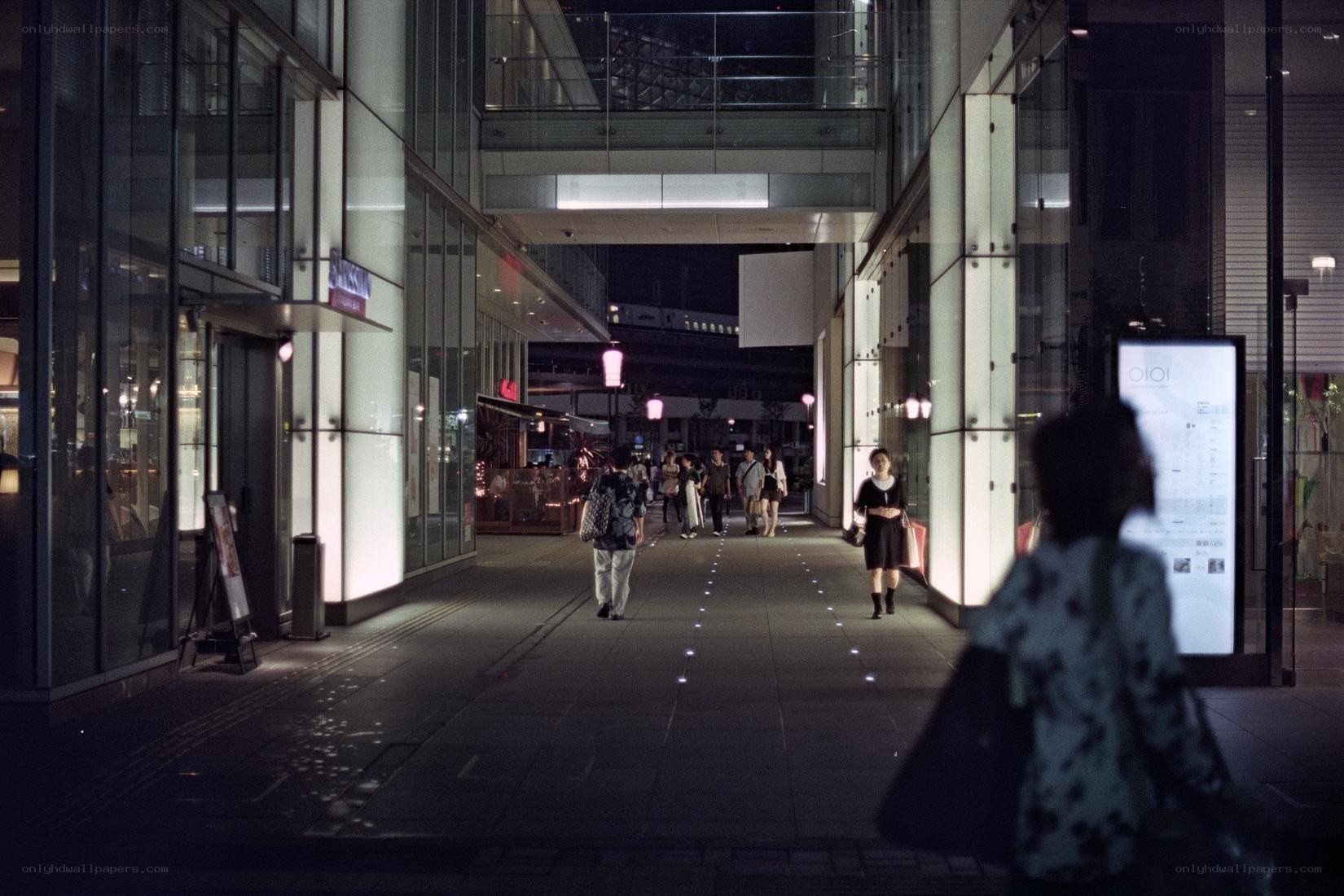 Nighttime walkway in a city