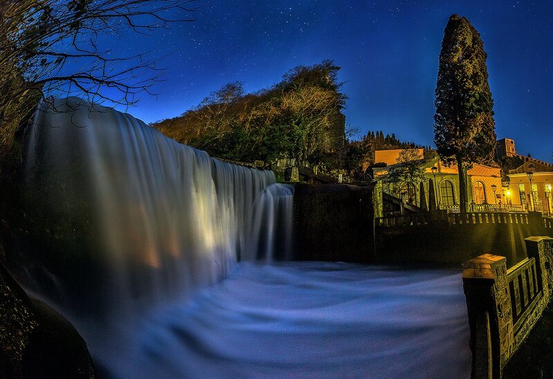 Nighttime Waterfall Scene — Blue