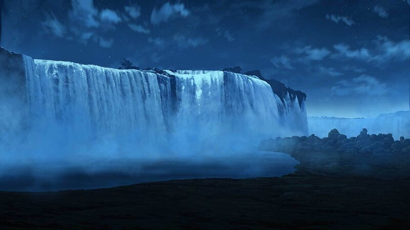 nighttime waterfall under stars