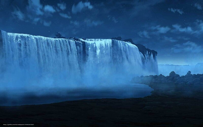 Nighttime waterfall under stars