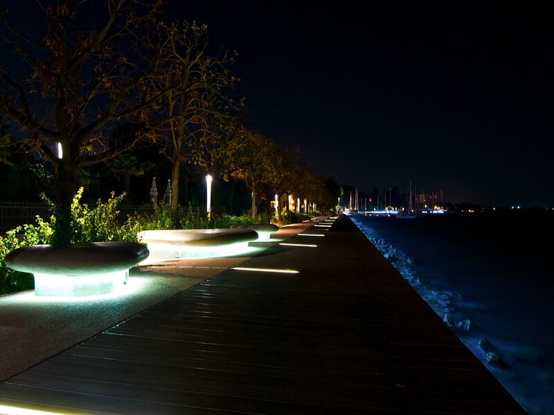 Nighttime waterfront promenade