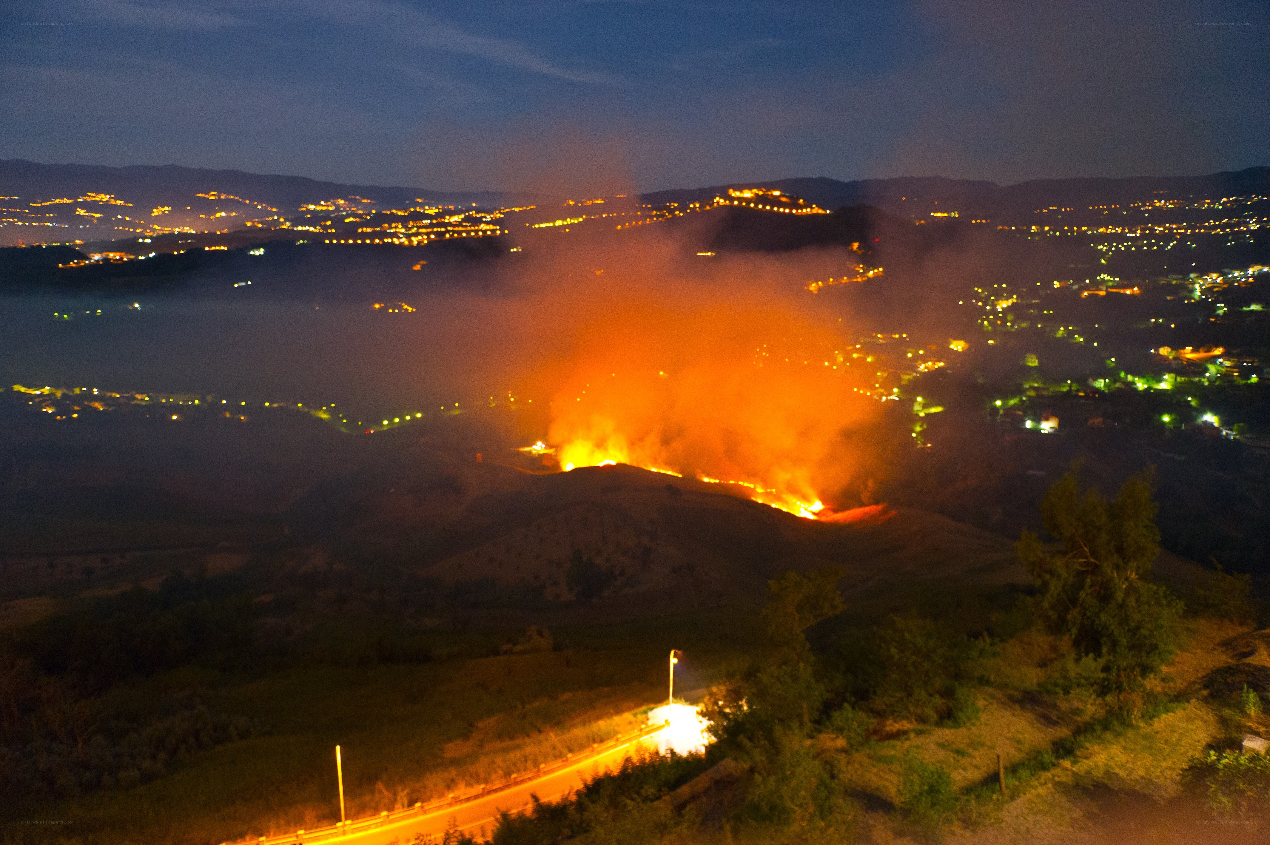 Nighttime wildfire in a valley