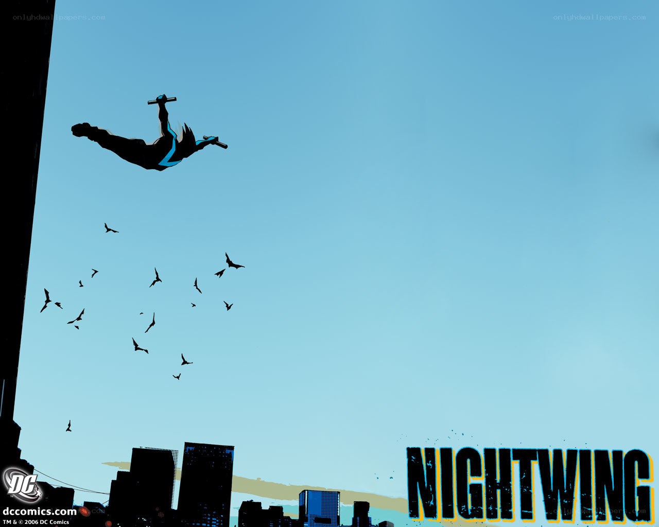 Nightwing in flight over city