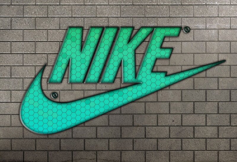 Nike logo on brick wall