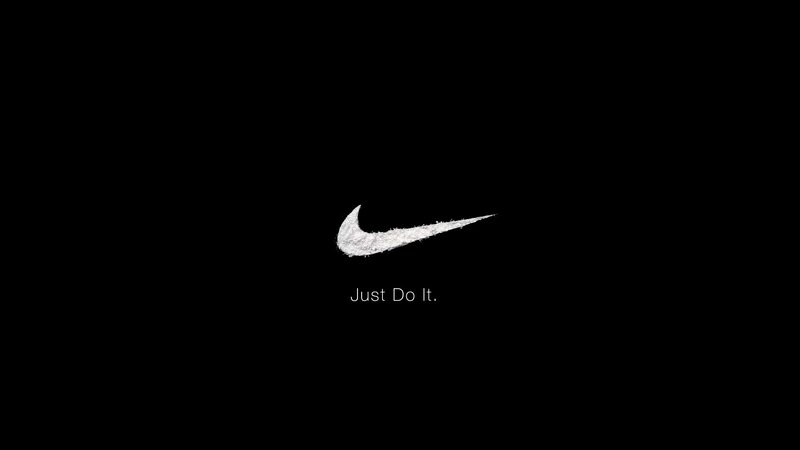 Nike logo with slogan